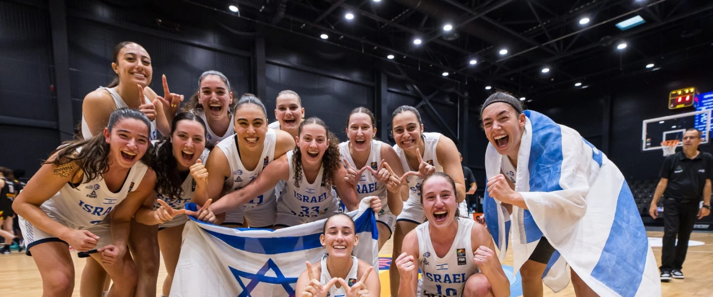 Israel’s U20 women’s basketball team celebrates its silver medal win on the court at European Championship in Lithuania, July 12, 2026. Credit: FIBA.