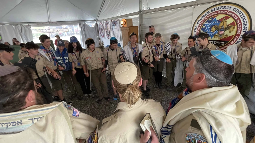 Singing “Siman Tov, Mazel Tov” after the bar mitzvahs of three fellow Jewish Scouts in the Synagogue Tent at the 2023 National Jamboree in Glen Jean, W.V., on July 24, 2023. Photo by the National Boy Scouts of America (BSA).