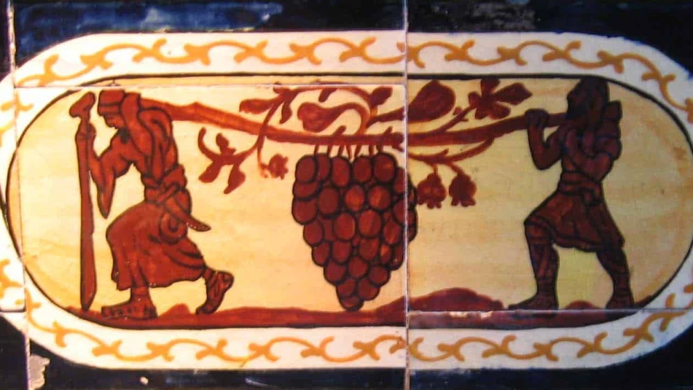 A mosaic depicting the biblical Israelite spies returning with grapes from Canaan. Credit: Yair Talmor via Wikimedia Commons.