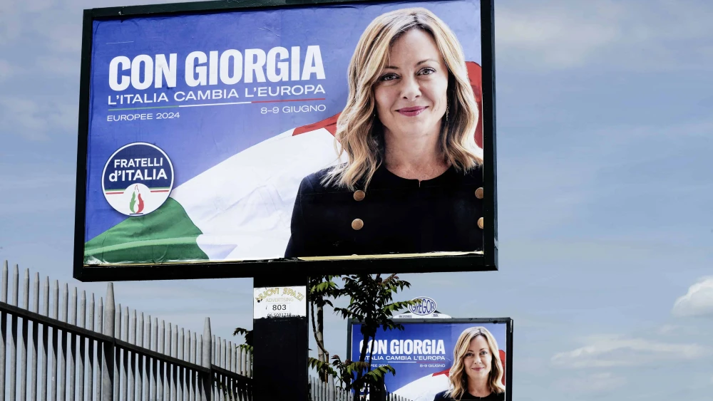 "With Giorgia, Italy changes Europe," read the posters in Rome depicting Italy's Prime Minister Giorgia Meloni ahead of June’s European Parliament election, April 27, 2024. Photo by Simona Granati-Corbis/Corbis via Getty Images.