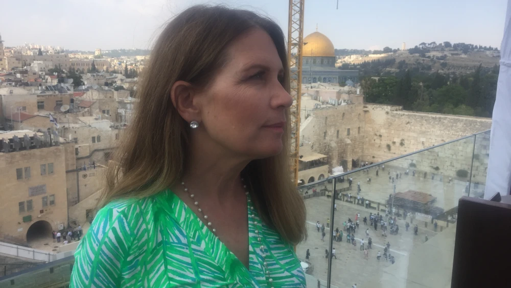 Former US Rep. Michele Bachmann on a rooftop overlooking the Western Wall and Temple Mount in Jerusalem. Credit: Alex Traiman.