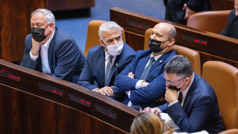 From left: Israeli Minister of Defense Benny Gantz, Foreign Affairs Minister Yair Lapid, Israeli Prime Minister Naftali Bennett and Israeli Minister of Justice Gideon Sa’ar during a plenum session and a vote on the state budget at the Knesset in Jerusalem on Nov. 3, 2021. Photo by Olivier Fitoussi/Flash90.