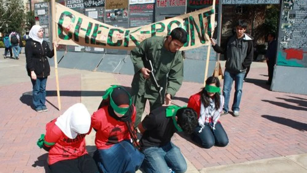 A mock checkpoint set up during “Israeli Apartheid Week,” an annual global anti-Israel initiative, at the University of California, Los Angeles. Credit: AMCHA Initiative.