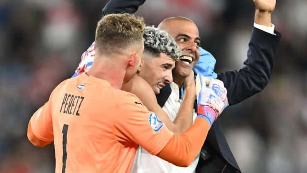 The Israel squad celebrates its penalty shootout victory over the Republic of Georgia at the 2023 UEFA European Under-21 Championship in Tbilisi, July 1, 2023. Source: Twitter.