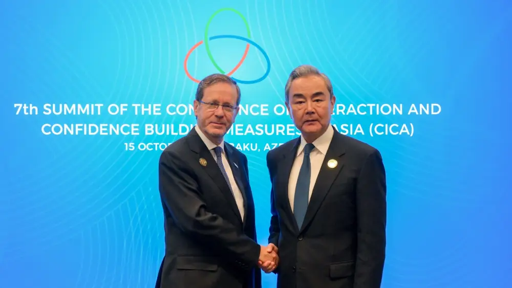 Israeli President Isaac Herzog meets Chinese Foreign Minister Wang Yi on the sidelines of an Asian security summit in Baku, Azerbaijan, Oct. 15, 2026. Photo by Ma'ayan Toaf/GPO.
