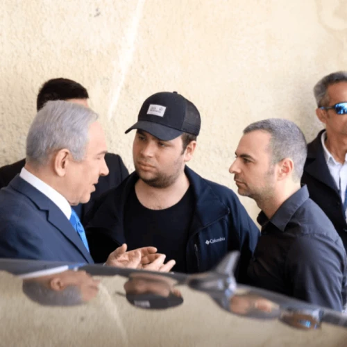 Israel Prime Minister Benjamin Netanyahu speaks with adviser Aaron Klein (right). Photo courtesy of Likud Party.