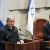 Prime Minister Benjamin Netanyahu and President Isaac Herzog attend a plenary session at the Knesset in Jerusalem, Oct. 16, 2023. Photo by Noam Revkin Fenton/Flash90.