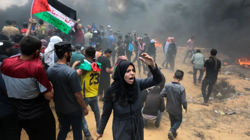 Palestinian protesters clash with Israeli forces near the Gaza-Israel border on May 14, 2018. Credit: Abed Rahim Khatib/Flash90.