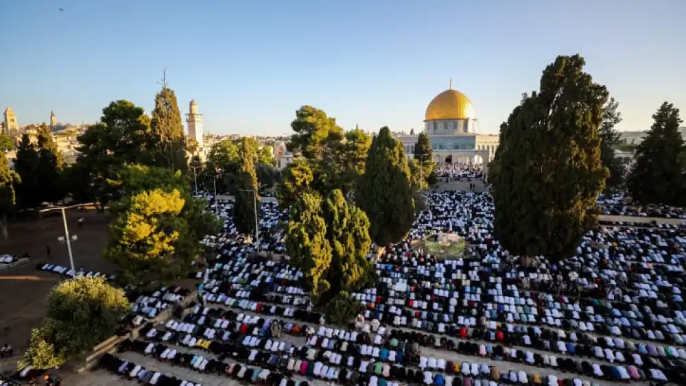 Muslims pray near the Al-Aqsa mosque on the Temple Mount during the Eid al-Adha holiday, June 28, 2023. Photo by Jamal Awad/Flash90.