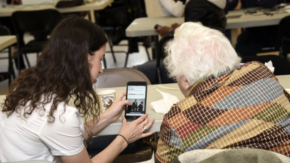 A picture that is included in “Smart Money,” a newly released study intended to help the Jewish community navigate the high-tech world. Credit: Lewis Kassel, courtesy of Moishe House.