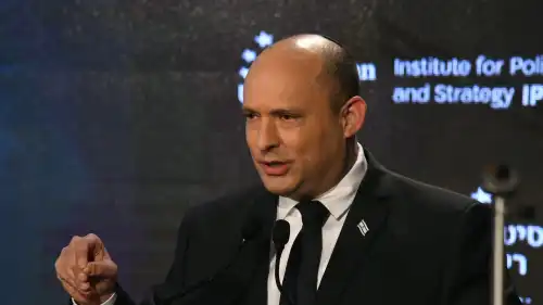 Israeli Prime Minister Naftali Bennett gives a speech at Reichman University in Herzliya, Nov. 23, 2021. Credit: Amos Ben Gershom/GPO.