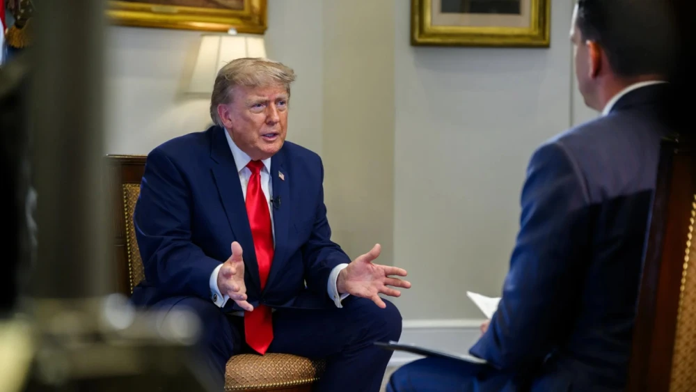 U.S. President Donald Trump participates in an interview with Trey Yingst of Fox News, in the Roosevelt Room of the White House, in Washington, D.C., July 14, 2026. Credit: Joyce Boghosian/White House.
