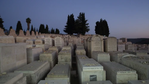 Nightly view of the Har HaMenuchot Jewish cemetery in the Jerusalem neighborhood of Givat Shaul. July 28, 2013. Photo by Yaakov Naumi/Flash90.