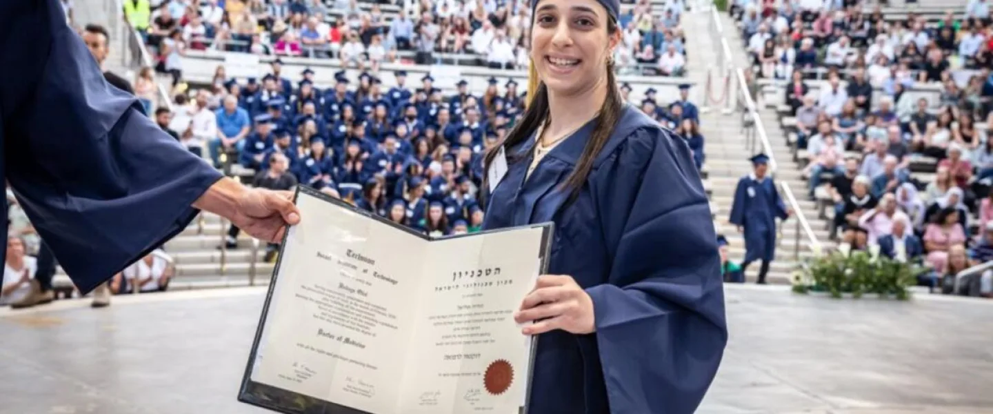 Hodaya Oliel at her graduation from the Technion’s medical school. Born with cerebral palsy, she plans to specialize in pediatric neurology. Photo courtesy of Technion-Israel Institute of Technology.