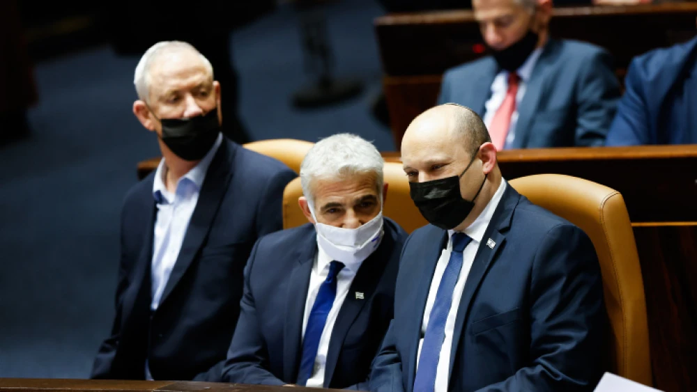 Israeli prime minister Naftali Bennett, Minister of Defense Benny Gantz and Minister of Foreign Affairs Yair Lapid attend a plenum session in the assembly hall of the Knesset, the Israeli parliament in Jerusalem on January 31, 2022. Photo by Olivier Fitoussi/Flash90