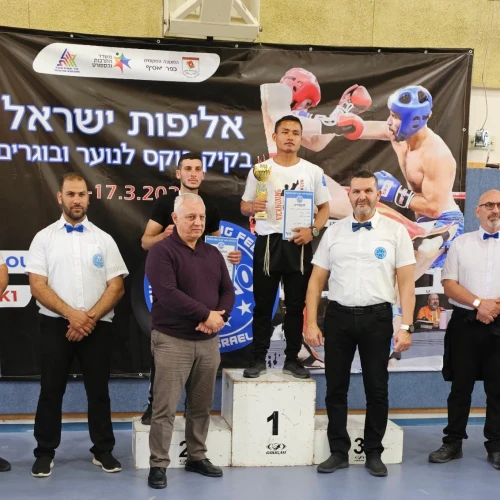 Obed Hrangchal stands in the champion's spot at the national tournament in Kfar Yasif, the Western Galilee, March 17, 2023. Courtesy.