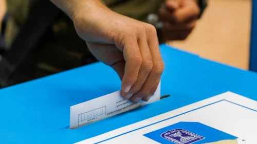An Israeli soldier casts an early vote on an army base near the Arab town of Kafr Qara on March 17, 2021, five days before the general election on March 23. Photo by Flash90.