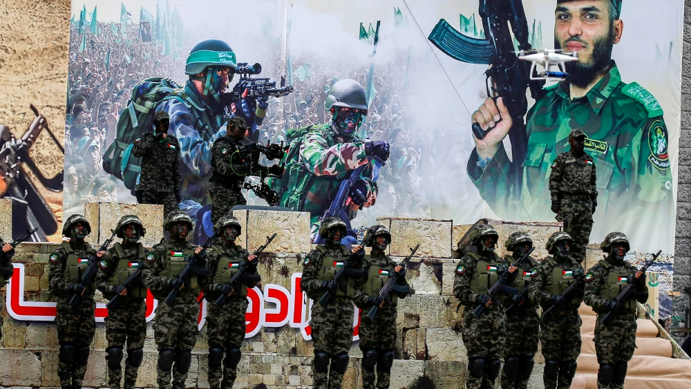 Palestinian members of the Al-Qassam Brigades, the armed wing of Hamas, at a rally in Gaza City celebrating the 31st anniversary of Hamas on Dec. 16, 2018. Credit: Abed Rahim Khatib/Flash90.