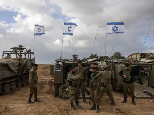Israeli soldiers and armored personnel carriers near the Gaza border, Nov. 20, 2023. Photo by Chaim Goldberg/Flash90.