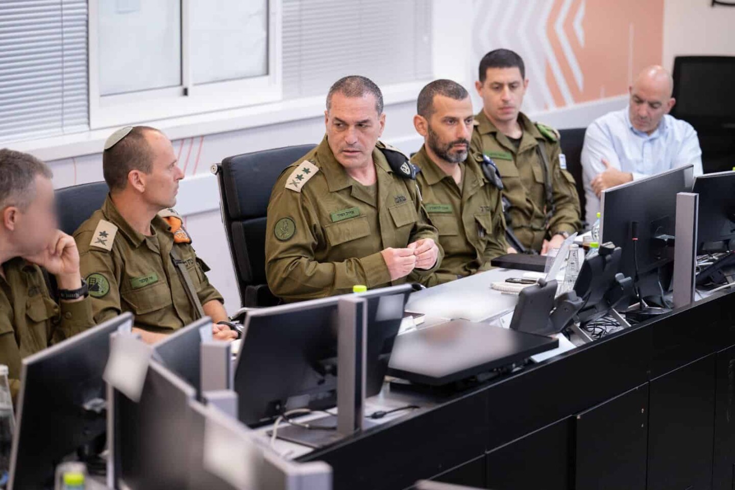 OC Home Front Command Maj. Gen. Shai Klapper (second from left) and Israel Defense Forces Chief of Staff Lt. Gen. Eyal Zamir (third from left) at Home Front Command headquarters in Ramle, March 8, 2026. Credit: IDF.