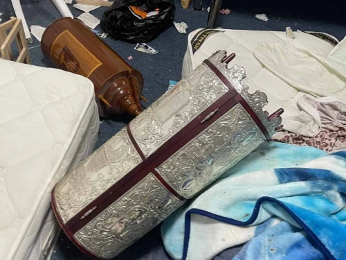 Torah scrolls lie on the floor of the Mishkan Shalom Yemenite Synagogue in Kadima-Zoran after vandals ripped holy books and scattered pages throughout the sanctuary. Image used under Section 27a of the Copyright Law for purposes of reporting the news.