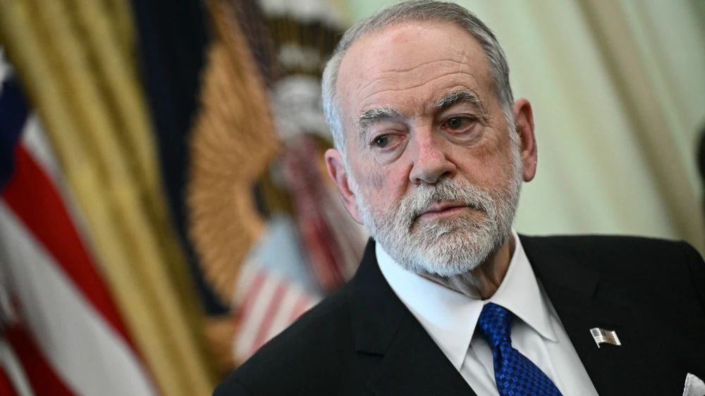 U.S. Ambassador to Israel Mike Huckabee listens during a meeting between President Donald Trump and Lebanese and Israeli envoys at the White House in Washington on April 23, 2026. Photo by Brendan Smialowski/AFP via Getty Images.