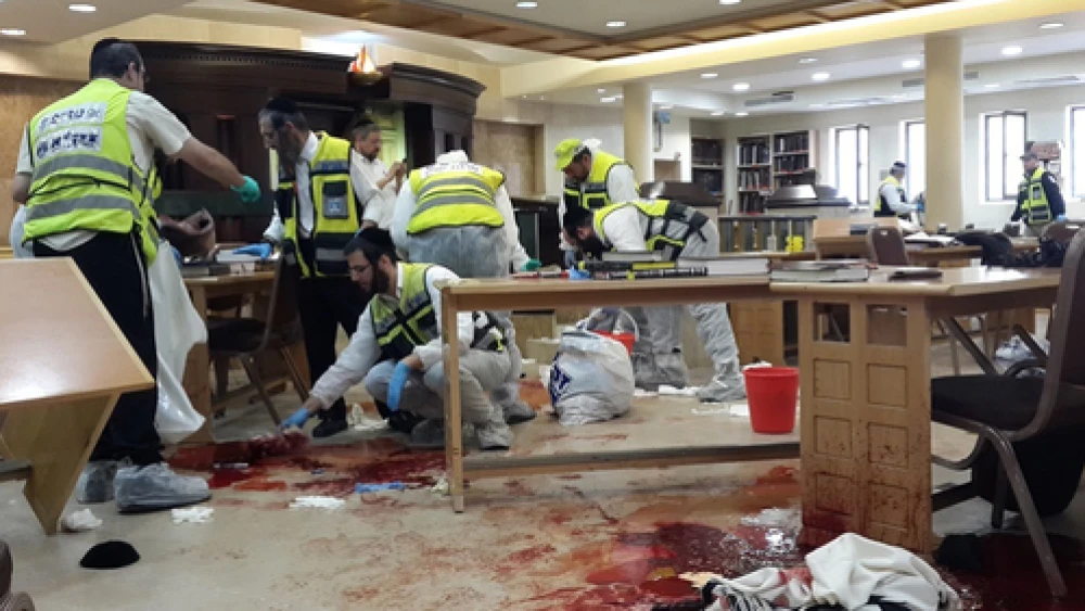 Israeli ZAKA first responders at the site on Nov. 18, 2014, where two Palestinian terrorists entered the Kehilat Yaakov synagogue in the Jewish neighborhood of Har Nof, Jerusalem, with pistols and axes, and began attacking worshippers. Five rabbis and a Druze police officer were murdered. Credit: ZAKA. Spokesperson.