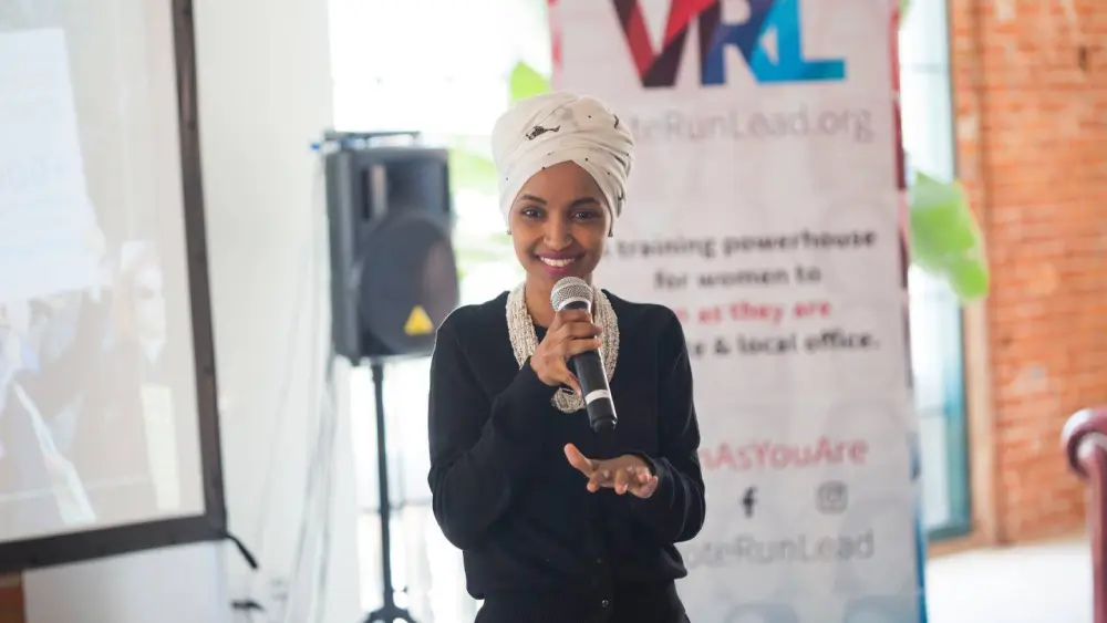 Ilhan Omar speaking at a VoteRunLead training. Credit: Zoe Griffing Heller via Wikimedia Commons.
