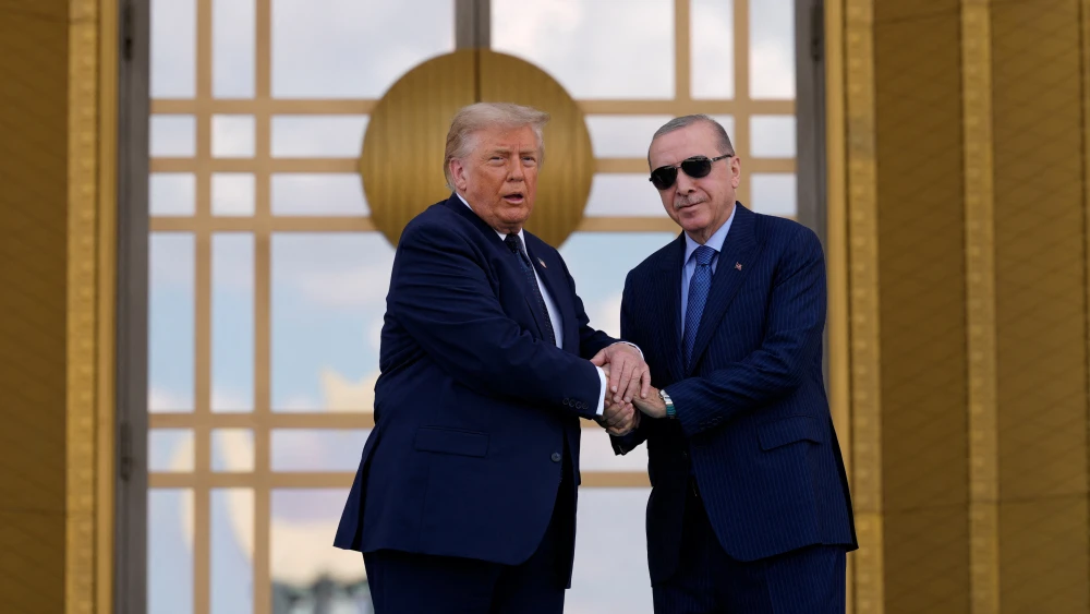 Turkish President Recep Tayyip Erdoğan shakes hands with U.S. President Donald Trump during a state arrival ceremony at Bestepe Presidential Compound in Ankara, on July 7, 2026, on the sidelines of the NATO Summit. Photo by Emrah Gurel /POOL/AFP via Getty Images.
