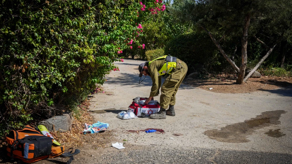 Israeli security and rescue forces at the site where an Israeli man was killed by a rocket fired from Lebanon, July 30, 2024. Photo by Ayal Margolin/Flash90.