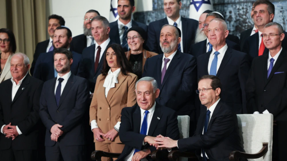 The new Israeli government, headed by Prime Minister Benjamin Netanyahu, poses for a group photo at the President's Residence in Jerusalem, Dec. 29, 2022. Photo by Yonatan SIndel/Flash90.