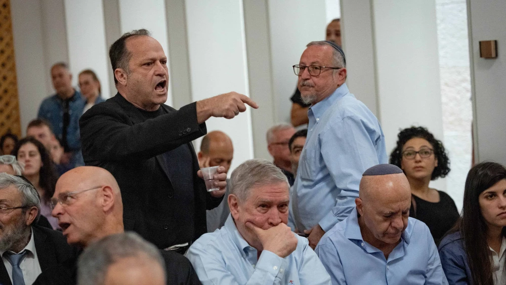 Itzik Buntzel, wearing black, speaks at a court hearing on petitions against the firing of Shin Bet director Ronen Bar at the Supreme Court in Jerusalem, April 8, 2025. Photo by Yonatan Sindel/Flash90.