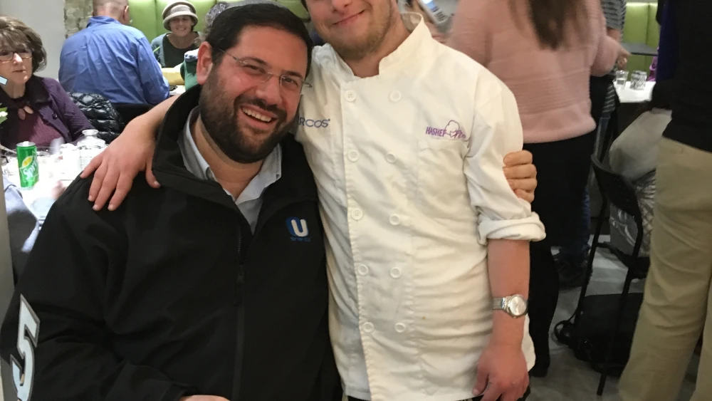 Yachad Israel member Elazar Ben-Dov with OU Israel executive director Rabbi Avi Berman at the Yachad Cafe. Credit: Orthodox Union.
