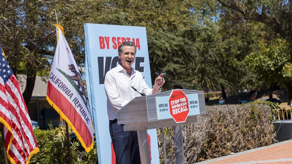 California Gov. Gavin Newsom speaks at his recall election rally at Culver City High School in Culver City, Calif., September 2021. Credit: Max Elram/Shutterstock.