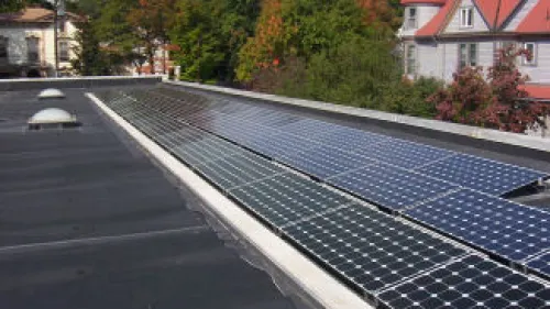 Beth El-Kesser Israel in New Haven, Conn., has a grid-tiled photovoltaic array on its synagogue roof due to the work of Rabbi Jon-Jay Tilsen and his son, Tzvi, for Tzvi's bar mitzvah project. Credit: Beth El-Kesser Israel.