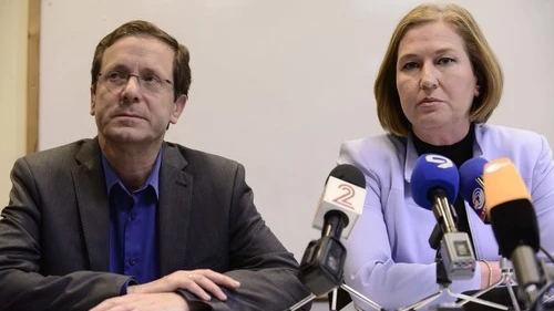 Zionist Union party leaders Isaac Herzog and Tzipi Livni are pictured at a press conference in Tel Aviv on March 18, when official Israeli election results revealed that they had been decisively defeated by Prime Minister Benjamin Netanyahu's Likud party. While two of the previous night's three television exit polls had Zionist Union and Likud tied at 27 Knesset seats, Likud would ultimately prevail with a comfortable 30-24 advantage. Credit: Tomer Neuberg/Flash90.