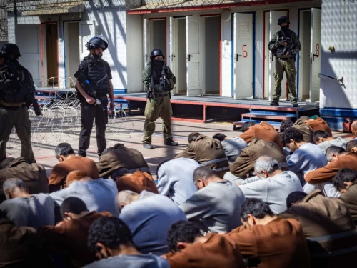 Israel Prison Service personnel guard terrorists caught during the Oct. 7 massacre and IDF operations in the Gaza Strip, at a prison in southern Israel, Feb. 14, 2024. Photo by Chaim Goldberg/Flash90.