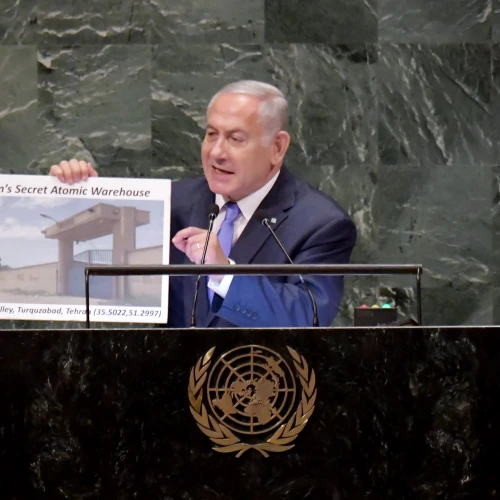 Israeli Prime Minister Benjamin Netanyahu addresses the U.N. General Assembly in New York, visual in hand, revealing a hidden Iranian nuclear facility and secret missiles in Lebanon’s capital, on Sept. 27, 2018. Photo by Avi Ohayon/GPO.