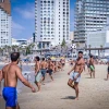 People enjoy the beach in Tel Aviv, Oct. 5, 2024. Photo by Avshalom Sassoni/Flash90.