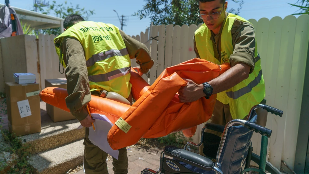Israeli Navy personnel rehearsing the wartime evacuation of patients in Shlomi, in northern Israel, on June 6, 2023. Credit; IDF Spokespersons Unit.