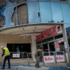 Residents of Kiryat Shmona check last night's missile-attack damage at the city's central bus station and mall on Nov. 27, 2024. Photo by Michael Giladi/Flash90.