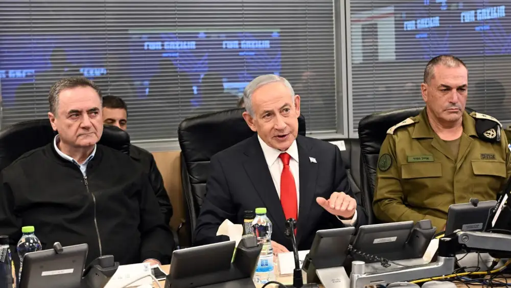 Israeli Prime Minister Benjamin Netanyahu, flanked by Defense Minister Israel Katz and Chief of Staff Lt. Gen. Eyal Zamir, conveys a message to the Iranian people from the Israeli Air Force command center, March 17, 2026. Photo by Haim Zach/GPO.