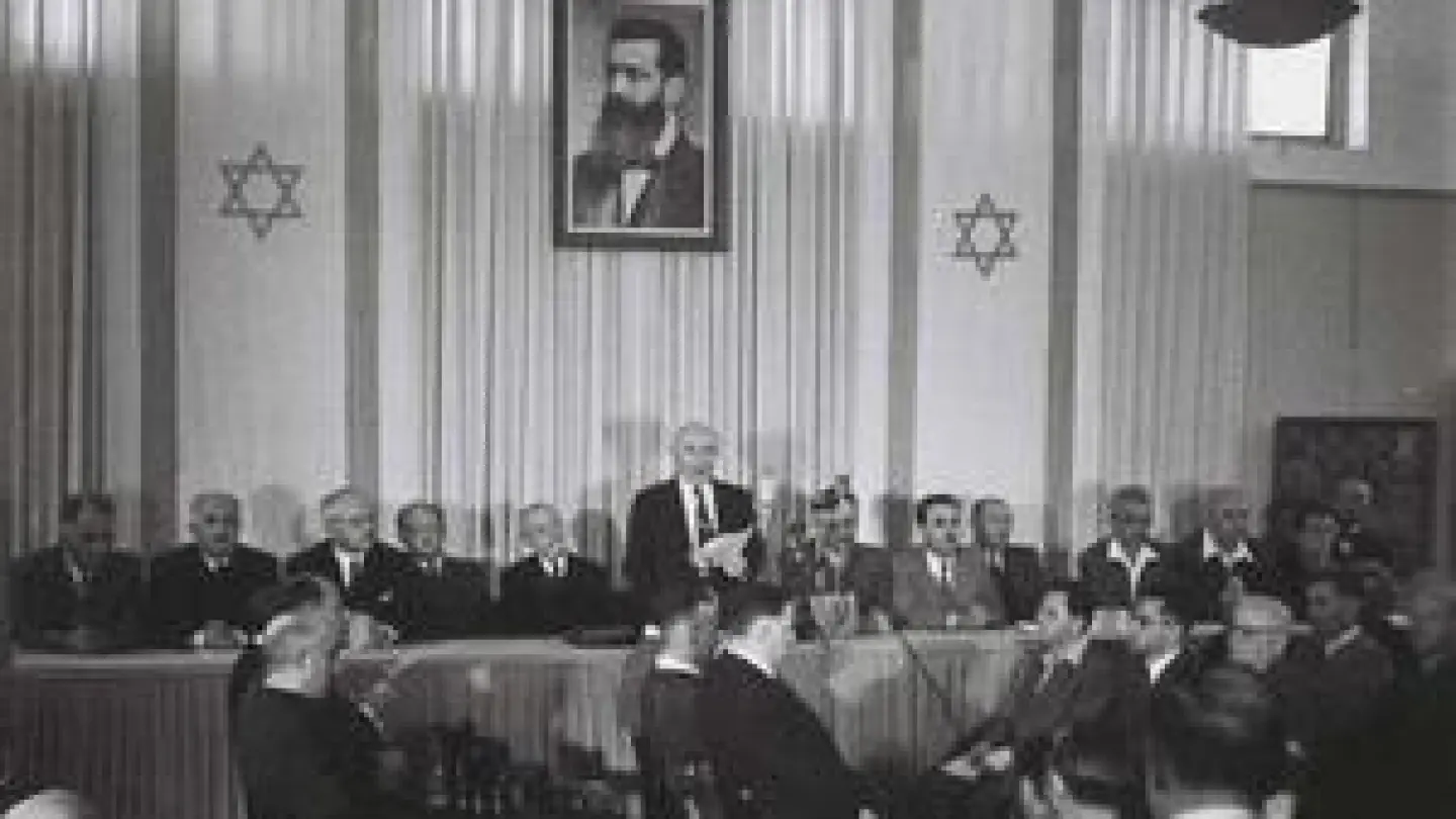 Israeli founding father and first prime minister David-Ben Gurion reading the declaration of the Independence of Israel in the Tel Aviv Museum, 1948. Credit: State of Israel National Photo Collection.