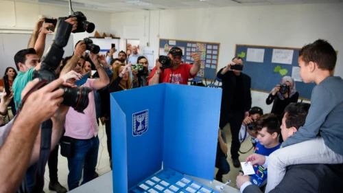 Israeli-Arab parliament member Ayman Odeh casts his ballot at a voting station in Haifa during Israel's national elections on April 9, 2019. Photo by Meir Vaknin/Flash90.