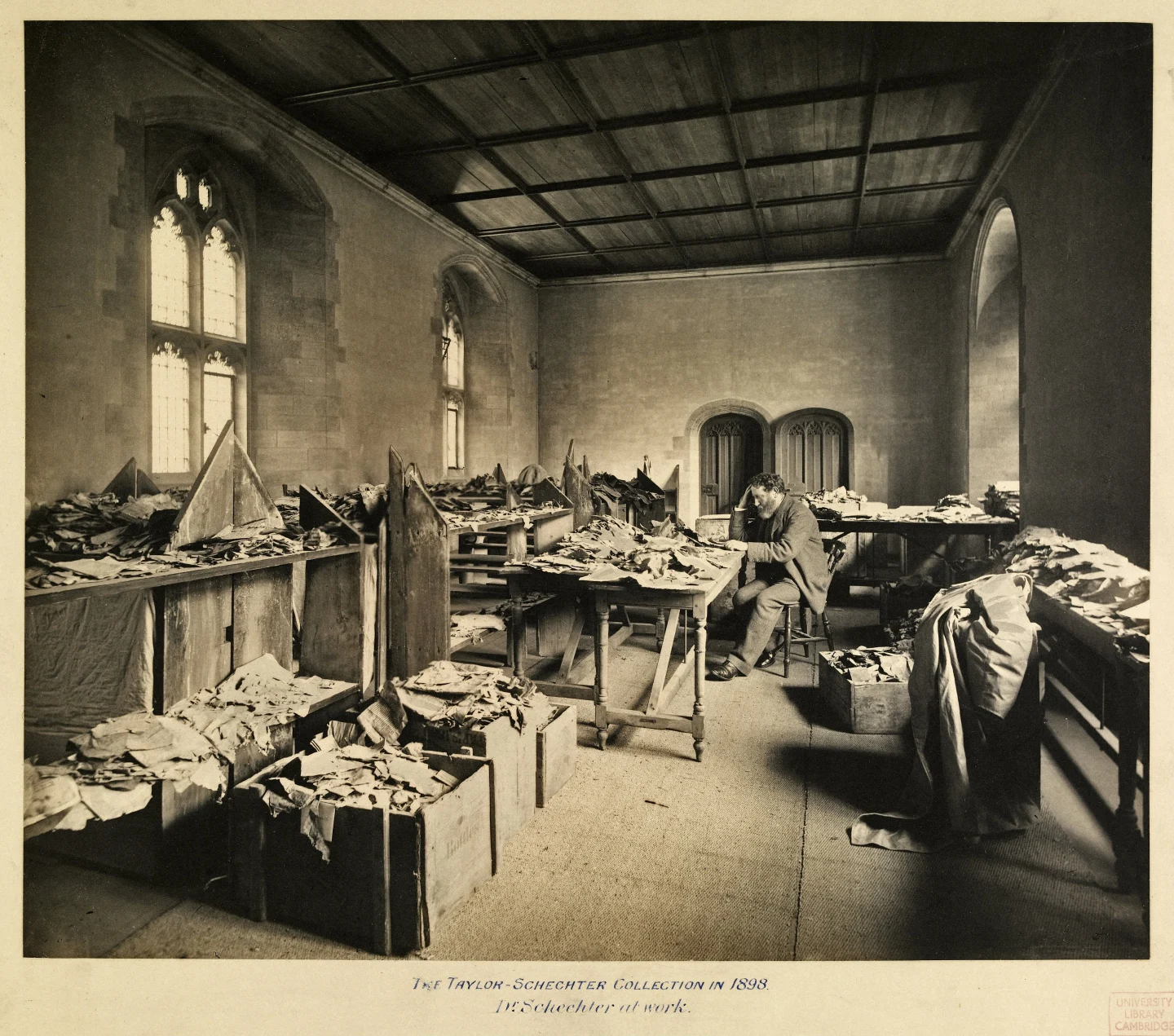 Solomon Schechter studying fragments of the Cairo Genizah, circa 1898. Credit: Public Domain via Wikimedia Commons.