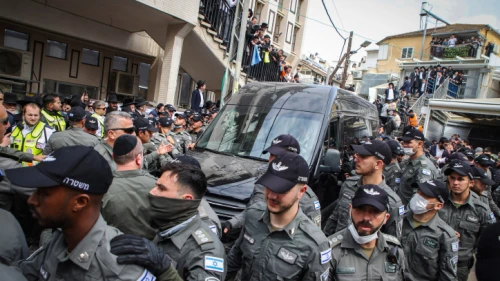Mourners attend the funeral of Rabbi Chaim Kanievsky at the cemetery in the city of Bnei Brak, on March 20, 2022. Photo by David Cohen/Flash90.