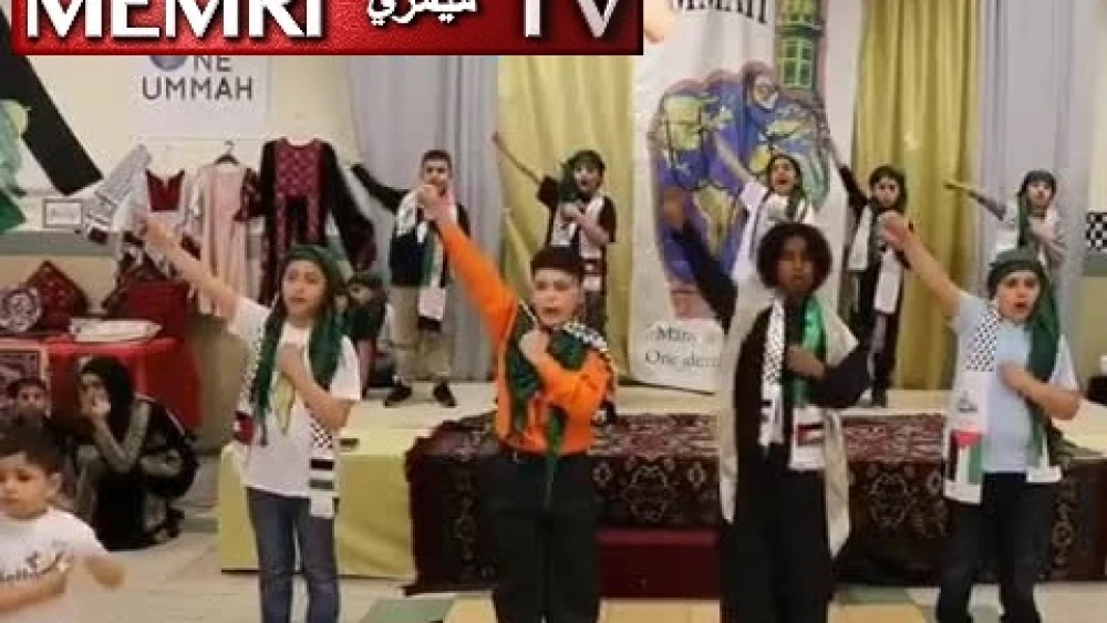 A still shot from a video posted on Facebook by the Muslim American Society Islamic Center in Philadelphia. In the video, young children wearing Palestinian scarves sing and read poetry about killing for Allah and the Al-Aqsa mosque. (MEMRI)