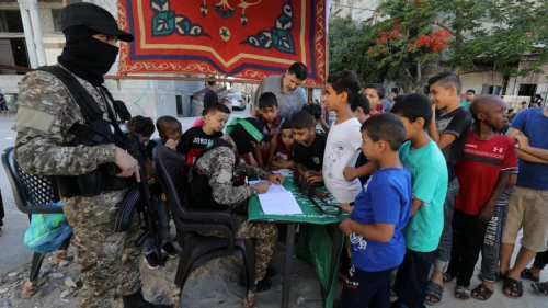 Hamas terrorists sign up Palestinian youth to "Sword of Jerusalem" camps, in Rafah, the southern Gaza Strip, on June 14, 2021. Photo by Abed Rahim Khatib/Flash90.