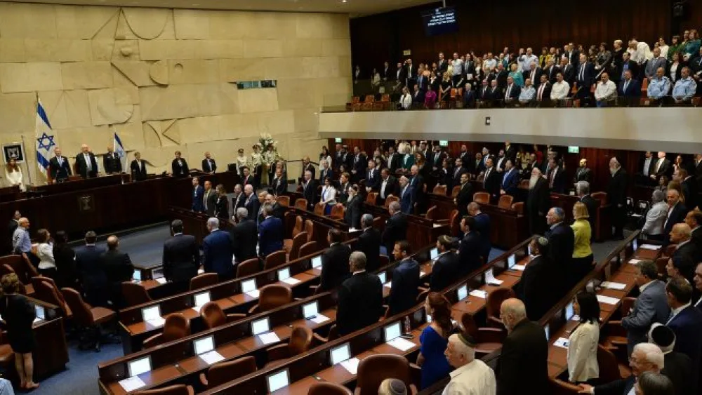 Israeli lawmakers stand during the inauguration of the 21st Knesset on May 28, 2019. Photo: Haim Zach/GPO.