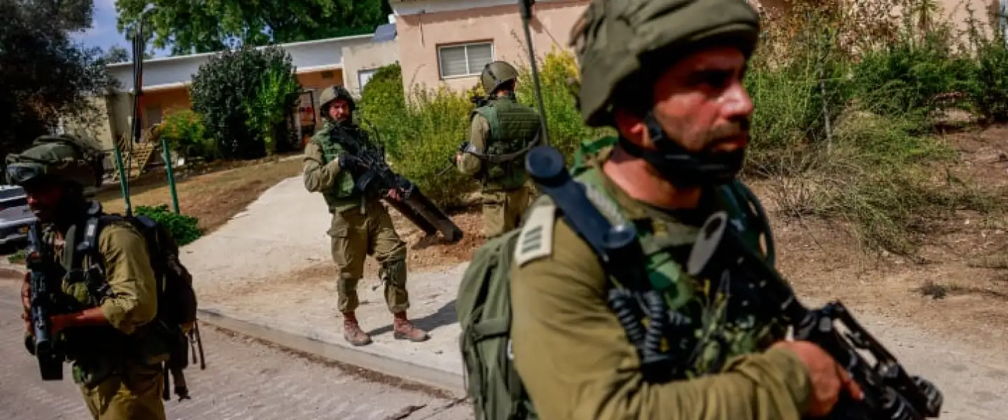 Israeli soldiers in Kibbutz Kfar Aza, near the Israeli-Gaza border in southern Israel, Oct. 10, 2023. Photo by Chaim Goldberg/Flash90.
